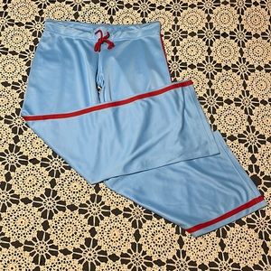 Vintage Playboy baby blue w/ red stripe activewear low-rise track pants. Size: L